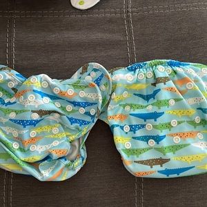 Bumkins diaper cover and velour pocket diaper in alligator print